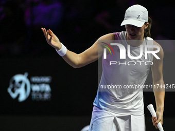 RIYADH, SAUDI ARABIA - NOVEMBER 05: Iga Swiatek of Poland during her match against Coco Gauff of USA, on day 4 of the 2024 WTA Finals, part...