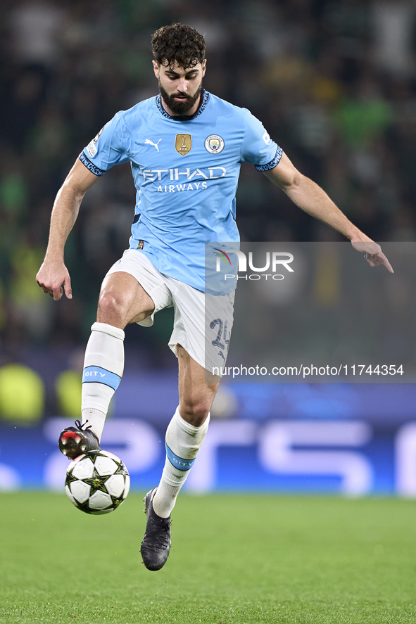 Josko Gvardiol of Manchester City is in action during the UEFA Champions League match between Sporting CP and Manchester City at Jose Alvala...