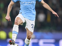 Josko Gvardiol of Manchester City is in action during the UEFA Champions League match between Sporting CP and Manchester City at Jose Alvala...