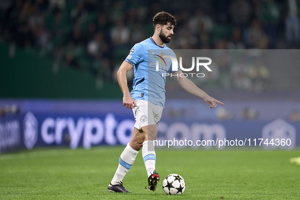 Josko Gvardiol of Manchester City is in action during the UEFA Champions League match between Sporting CP and Manchester City at Jose Alvala...