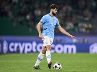 Josko Gvardiol of Manchester City is in action during the UEFA Champions League match between Sporting CP and Manchester City at Jose Alvala...