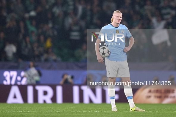 Erling Haaland of Manchester City reacts after Viktor Gyokeres of Sporting CP scores his team's first goal during the UEFA Champions League...