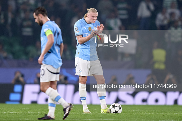 Erling Haaland of Manchester City reacts after Viktor Gyokeres of Sporting CP scores his team's first goal during the UEFA Champions League...