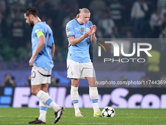 Erling Haaland of Manchester City reacts after Viktor Gyokeres of Sporting CP scores his team's first goal during the UEFA Champions League...