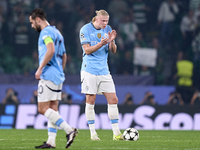 Erling Haaland of Manchester City reacts after Viktor Gyokeres of Sporting CP scores his team's first goal during the UEFA Champions League...