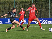 Noemi Visentin of S.S. Lazio and Tuva Sagen of F.C. Como Women participate in the round of 16 of Coppa Italia Femminile between S.S. Lazio a...