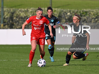 Mina Bergersen of F.C. Como Women and Zsanett Kajan of S.S. Lazio participate in the round of 16 of Coppa Italia Femminile between S.S. Lazi...