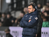 Manager Filipe Coelho, the manager of Chelsea Under 21, looks on during the EFL Trophy match between Cambridge United and Chelsea Under 21s...