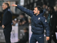 Manager Filipe Coelho, the manager of Chelsea Under 21, points during the EFL Trophy match between Cambridge United and Chelsea Under 21s at...