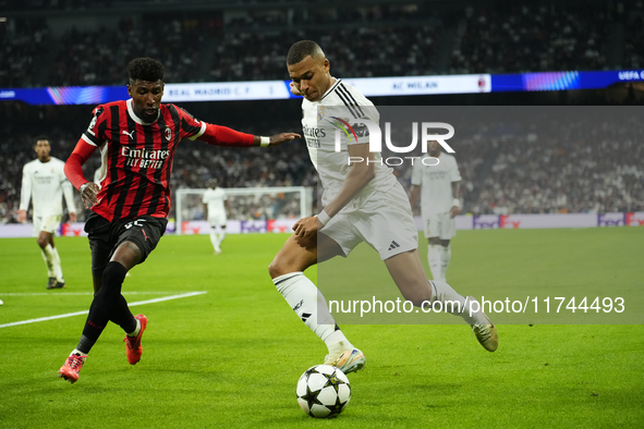 Kylian Mbappe centre-forward of Real Madrid and France and Emerson Royal right-back of AC Milan and Brazil compete for the ball during the U...