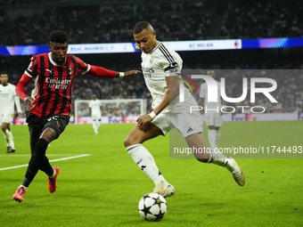 Kylian Mbappe centre-forward of Real Madrid and France and Emerson Royal right-back of AC Milan and Brazil compete for the ball during the U...