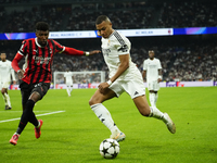 Kylian Mbappe centre-forward of Real Madrid and France and Emerson Royal right-back of AC Milan and Brazil compete for the ball during the U...