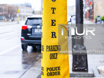 A parking meter cover indicates parking for voters in front of the Minnesota Book Arts Center on Election Day 2024 in Minneapolis, Minnesota...