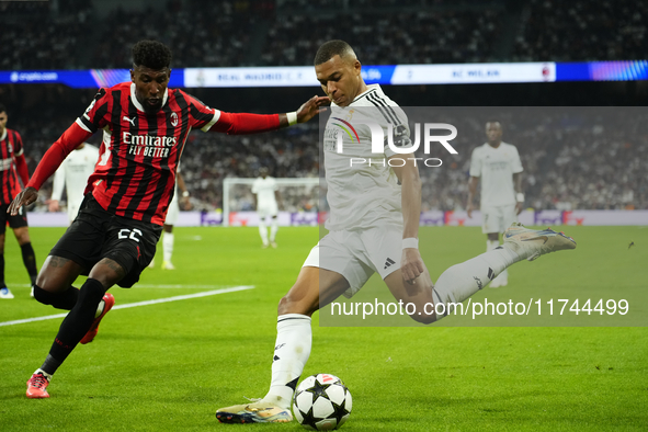 Kylian Mbappe centre-forward of Real Madrid and France and Emerson Royal right-back of AC Milan and Brazil compete for the ball during the U...