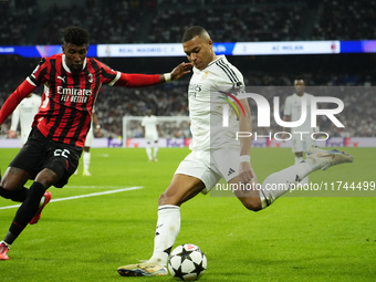 Kylian Mbappe centre-forward of Real Madrid and France and Emerson Royal right-back of AC Milan and Brazil compete for the ball during the U...