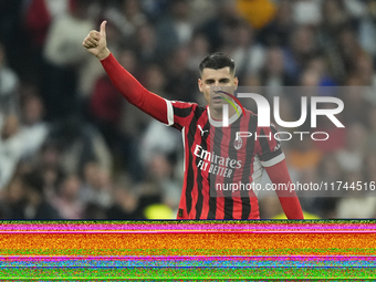 Alvaro Morata centre-forward of AC Milan and Spain celebrates after scoring his sides first goal during the UEFA Champions League 2024/25 Le...