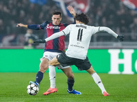 Nikola Moro of Bologna FC and Maghnes Akliouche of AS Monaco compete for the ball during the UEFA Champions League 2024/25 League Phase MD4...