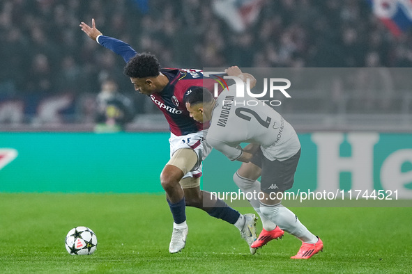 Dan Ndoye of Bologna FC and Vanderson of AS Monaco compete for the ball during the UEFA Champions League 2024/25 League Phase MD4 match betw...