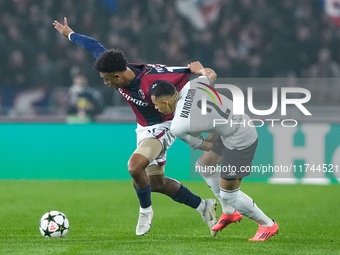 Dan Ndoye of Bologna FC and Vanderson of AS Monaco compete for the ball during the UEFA Champions League 2024/25 League Phase MD4 match betw...