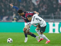 Dan Ndoye of Bologna FC and Vanderson of AS Monaco compete for the ball during the UEFA Champions League 2024/25 League Phase MD4 match betw...