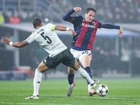 Giovanni Fabbian of Bologna FC and Thilo Kehrer of AS Monaco compete for the ball during the UEFA Champions League 2024/25 League Phase MD4...