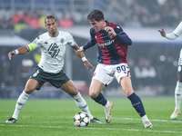 Giovanni Fabbian of Bologna FC and Thilo Kehrer of AS Monaco compete for the ball during the UEFA Champions League 2024/25 League Phase MD4...