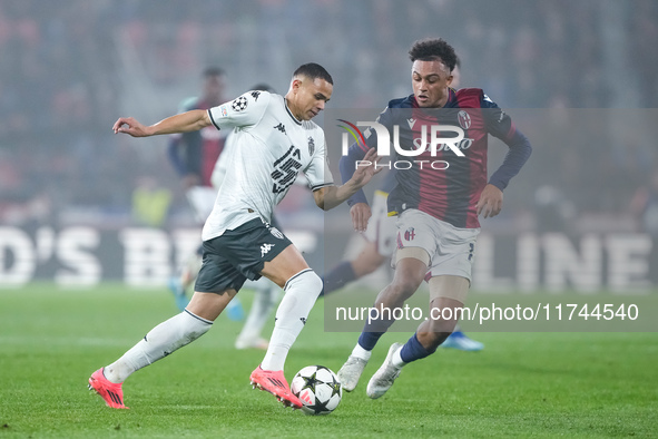 Vanderson of AS Monaco and Dan Ndoye of Bologna FC compete for the ball during the UEFA Champions League 2024/25 League Phase MD4 match betw...