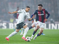 Vanderson of AS Monaco and Dan Ndoye of Bologna FC compete for the ball during the UEFA Champions League 2024/25 League Phase MD4 match betw...