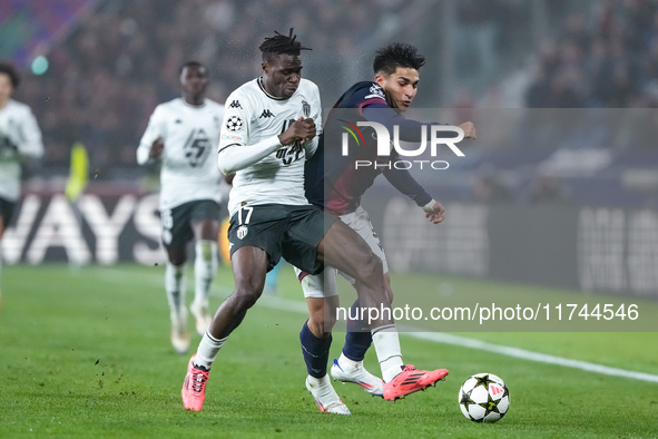 Wilfried Singo of AS Monaco and Santiago Castro of Bologna FC compete for the ball during the UEFA Champions League 2024/25 League Phase MD4...