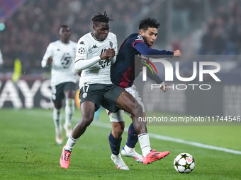 Wilfried Singo of AS Monaco and Santiago Castro of Bologna FC compete for the ball during the UEFA Champions League 2024/25 League Phase MD4...