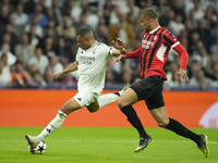 Kylian Mbappe centre-forward of Real Madrid and France shooting to goal front Malick Thiaw centre-back of AC Milan and Germany during the UE...