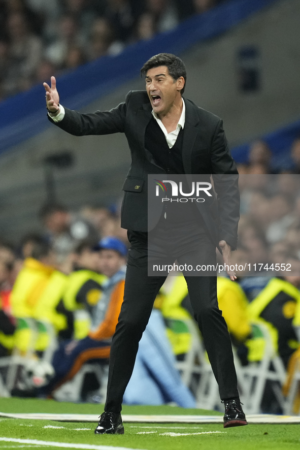 Paulo Fonseca head coach of AC Milan gives instructions during the UEFA Champions League 2024/25 League Phase MD4 match between Real Madrid...