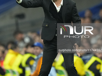 Paulo Fonseca head coach of AC Milan gives instructions during the UEFA Champions League 2024/25 League Phase MD4 match between Real Madrid...