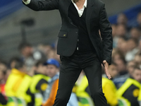 Paulo Fonseca head coach of AC Milan gives instructions during the UEFA Champions League 2024/25 League Phase MD4 match between Real Madrid...