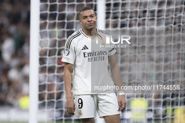 Kylian Mbappe of Real Madrid reacts to a missed opportunity during the UEFA Champions League 2024/25 match between Real Madrid and AC Milan...