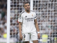 Kylian Mbappe of Real Madrid reacts to a missed opportunity during the UEFA Champions League 2024/25 match between Real Madrid and AC Milan...