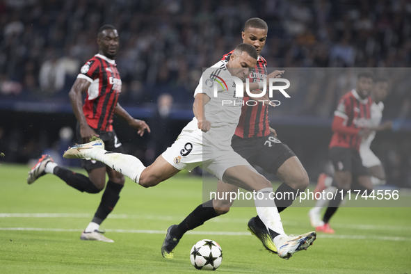 Kylian Mbappe of Real Madrid attempts a shot during the UEFA Champions League 2024/25 match between Real Madrid and AC Milan at Santiago Ber...