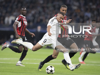 Kylian Mbappe of Real Madrid attempts a shot during the UEFA Champions League 2024/25 match between Real Madrid and AC Milan at Santiago Ber...