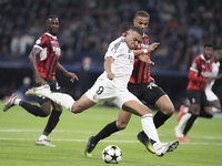 Kylian Mbappe of Real Madrid attempts a shot during the UEFA Champions League 2024/25 match between Real Madrid and AC Milan at Santiago Ber...