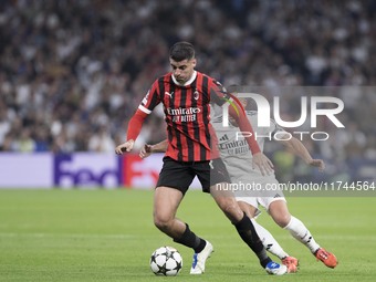 Alvaro Morata of AC Milan is in action during the UEFA Champions League 2024/25 match between Real Madrid and AC Milan at Santiago Bernabeu...