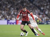 Alvaro Morata of AC Milan is in action during the UEFA Champions League 2024/25 match between Real Madrid and AC Milan at Santiago Bernabeu...