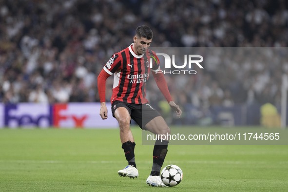 Alvaro Morata of AC Milan is in action during the UEFA Champions League 2024/25 match between Real Madrid and AC Milan at Santiago Bernabeu...