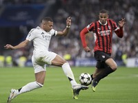 Kylian Mbappe of Real Madrid controls the ball during the UEFA Champions League 2024/25 match between Real Madrid and AC Milan at Santiago B...