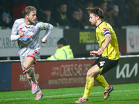 Number 9, Will Swan of Crawley Town, is in attacking action during the Sky Bet League 1 match between Burton Albion and Crawley Town at the...