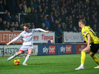 Harry Forster of Crawley Town sets up a cross during the Sky Bet League 1 match between Burton Albion and Crawley Town at the Pirelli Stadiu...