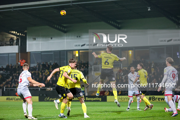 Ryan Sweeney of Burton Albion heads the ball away during the Sky Bet League 1 match between Burton Albion and Crawley Town at the Pirelli St...