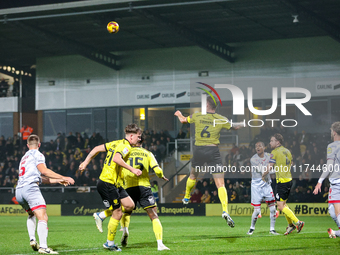 Ryan Sweeney of Burton Albion heads the ball away during the Sky Bet League 1 match between Burton Albion and Crawley Town at the Pirelli St...