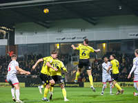 Ryan Sweeney of Burton Albion heads the ball away during the Sky Bet League 1 match between Burton Albion and Crawley Town at the Pirelli St...