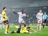 #12, Panutche Camara of Crawley Town (center) attempts a shot on goal during the Sky Bet League 1 match between Burton Albion and Crawley To...