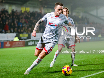 Toby Mullarkey of Crawley Town is in attacking action during the Sky Bet League 1 match between Burton Albion and Crawley Town at the Pirell...